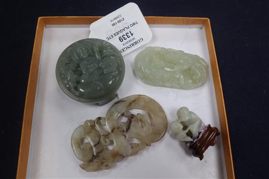 Two Chinese jade plaques and a belt buckle and a monkey group